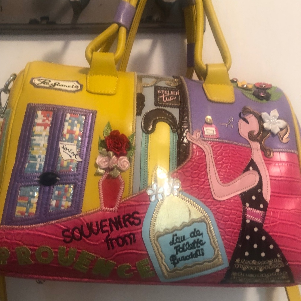 Satchel shape bag. Colorful, whimsical appliqués. Shoulder/crossbody strap.